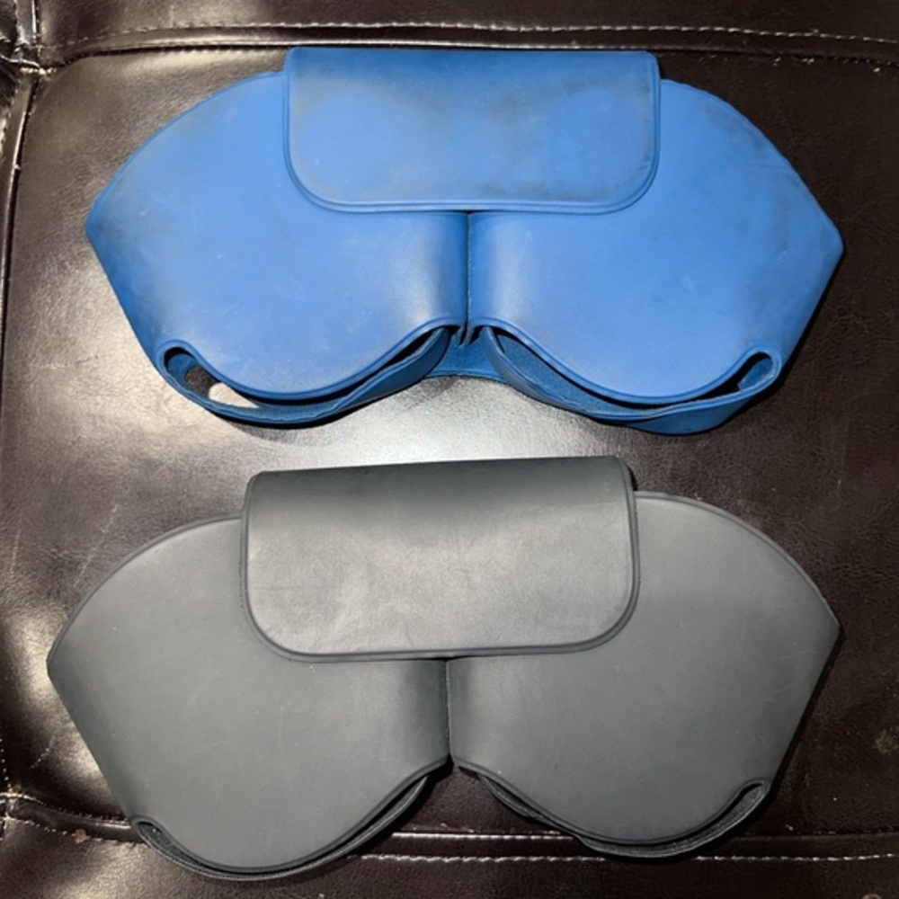 Blue and black AirPod max cases